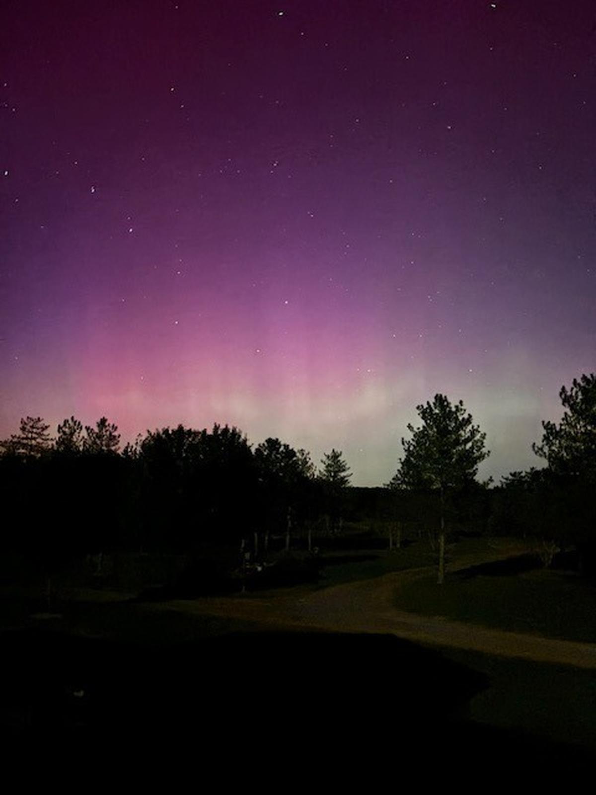 Rhonda Clouser shares her view of the northern lights Thursday from her Frenchville home in Clearfield County.