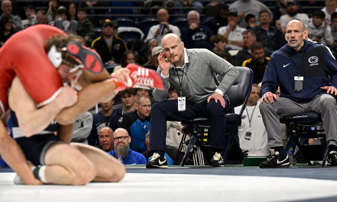 Penn State wrestling coach Cael Sanderson yells to Levi Haines as he wrestles Nebraska’s Christopher Minto in the 174-pound championship bout at the Big Ten wrestling championships on Sunday, March 8, 2026.