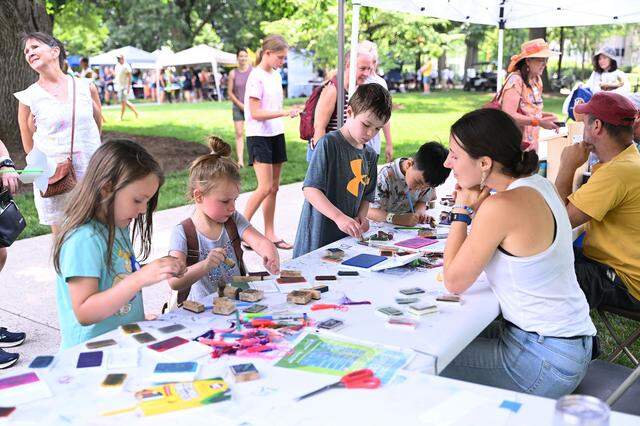 Youngster spent time making book markers during Wednesday’s Children and Youth Day at the 57th Central Pennsylvania Festival of the Arts in State College.