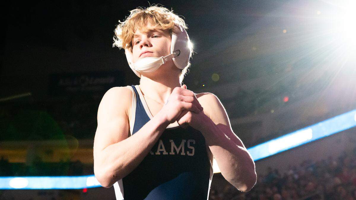 Penns Valley's Max Dinges prepares to face Bishop McCort's Keegan Bassett in the 121-pound finals of the PIAA Class 2A Wrestling Championships on Saturday, March 7, 2026 in the Giant Center in Hershey, Pa. Bassett won by decision 4-2.