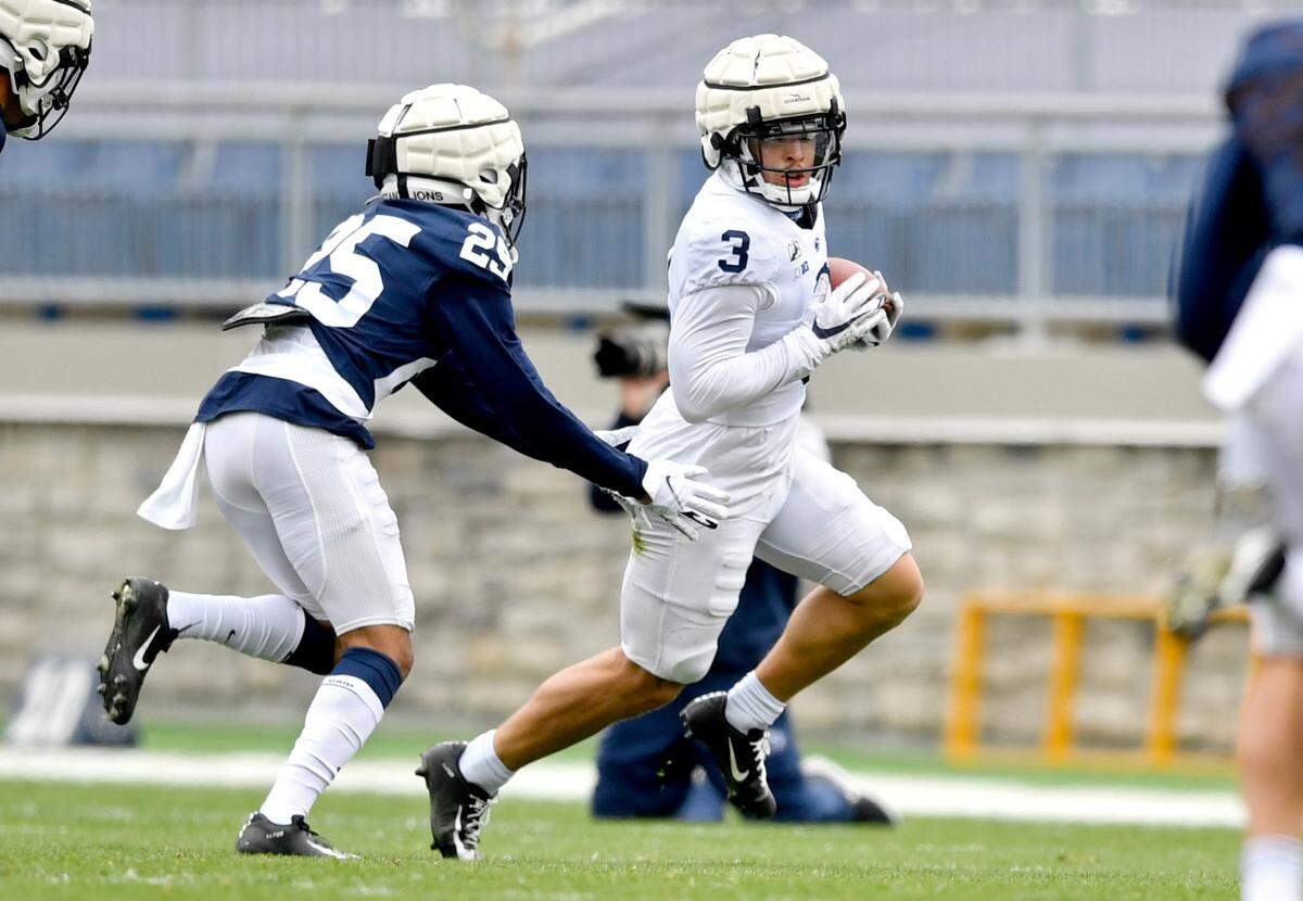 Penn State cornerback Daequan Hardy canÕt stop wide receiver Parker Washington during spring practice on Saturday, April 17, 2021 at Beaver Stadium.