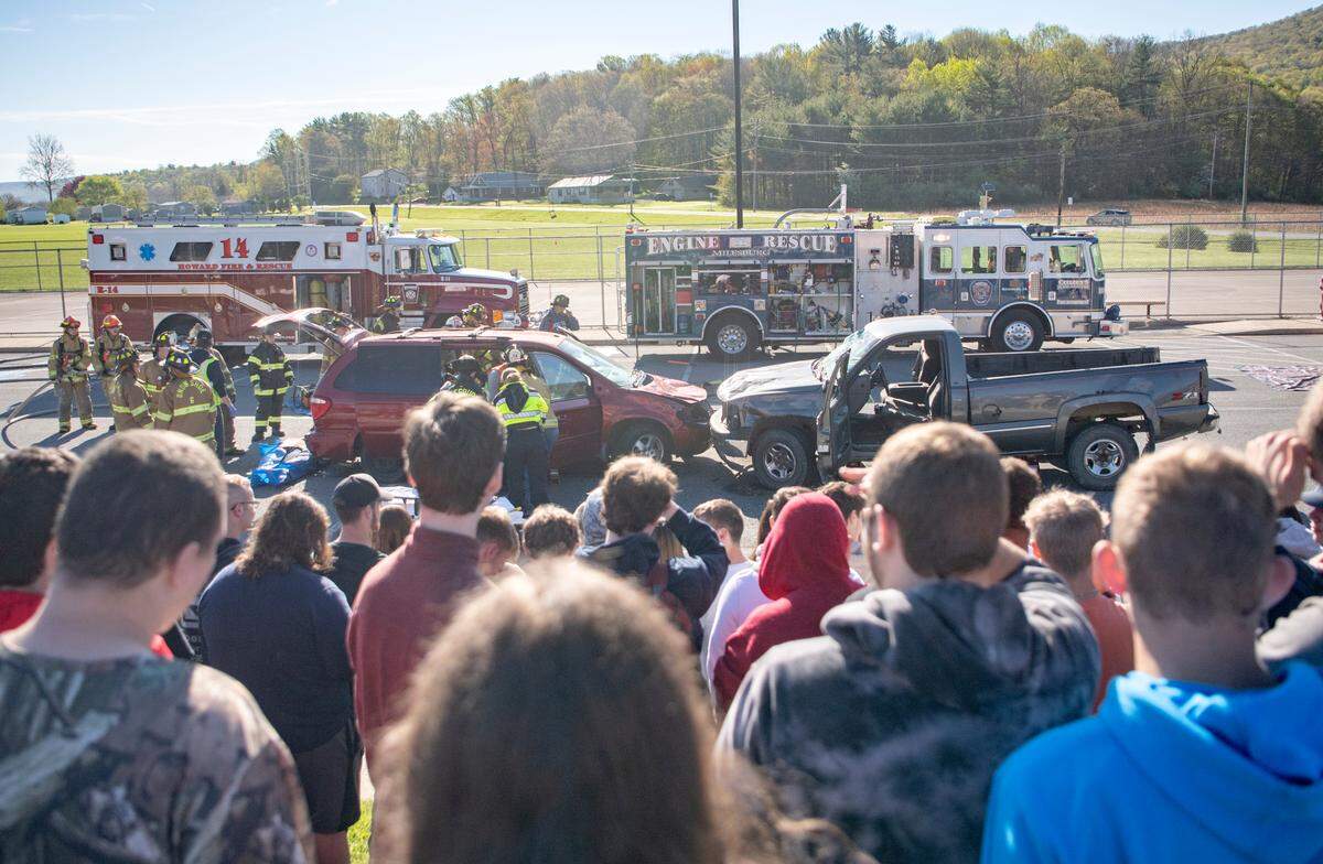 Firefighters, EMTs, Pennsylvania State Troopers, Life Flight and the Centre County coroner participate in a mock accident for students of Bald Eagle Area High School on Tuesday, May 10, 2022.