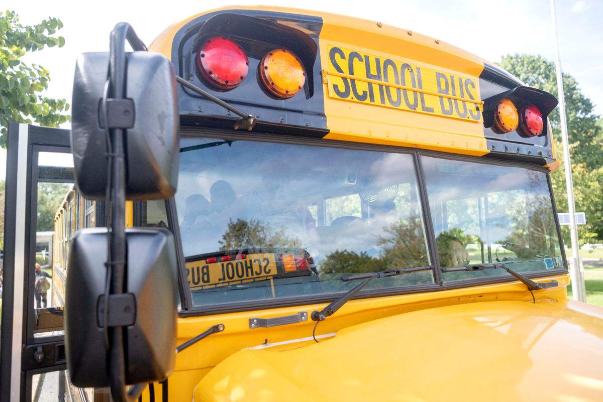 Students from Our Lady of Victory get into the bus after school on Friday, Sept. 22, 2023.