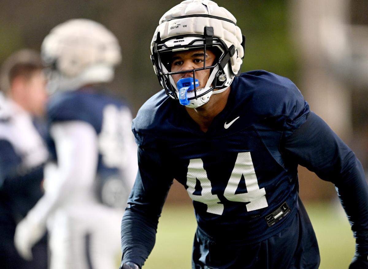 Penn State defensive end Chop Robinson runs a drill during practice on Wednesday, Nov. 8, 2023.