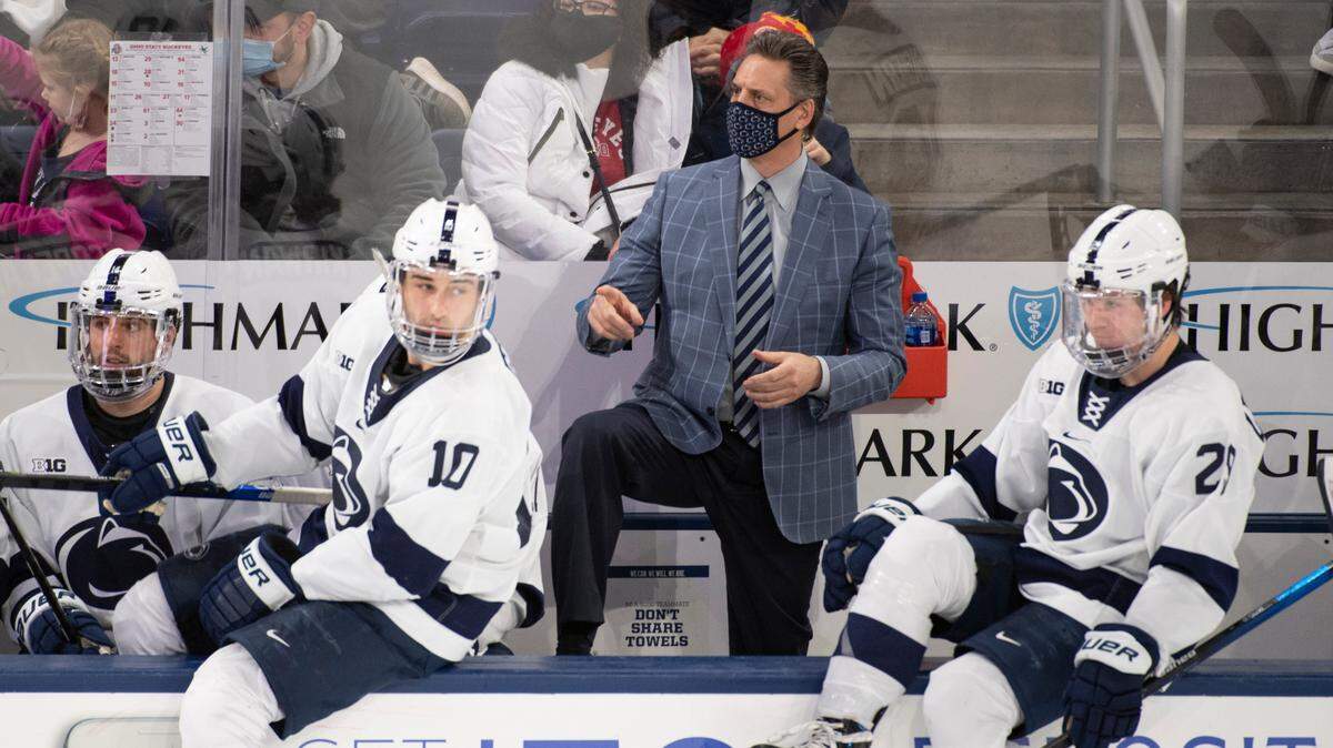 Penn State head coach Guy Gadowsky talks to his bench players during a NCAA Hockey match between Penn State and Ohio State at Pegula Arena on Jan. 29.