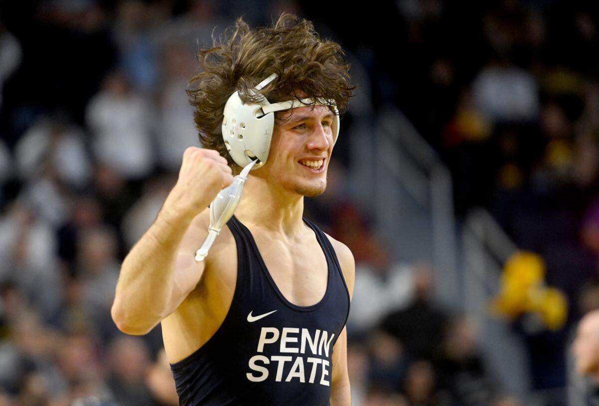 Penn State’s Levi Haines celebrates his sudden victory win over Nebraska’s Peyton Robb in the 157 lb championship bout of the Big Ten wrestling championships at the Crisler Center on Sunday, March 5, 2023.