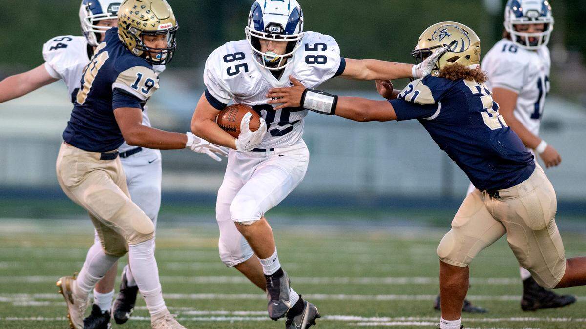 Penns Valley’s Tanner Ilgen cuts down the field past Bald Eagle Area’s Tre Greene during the game on Friday, Sept. 24, 2021.