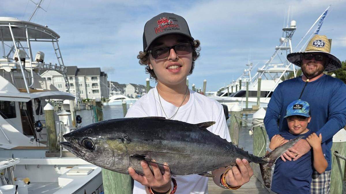 Bellefonte teen Rees Stewart poses with a fish he caught during a deep-sea expedition he went on thanks to Make-A-Wish.