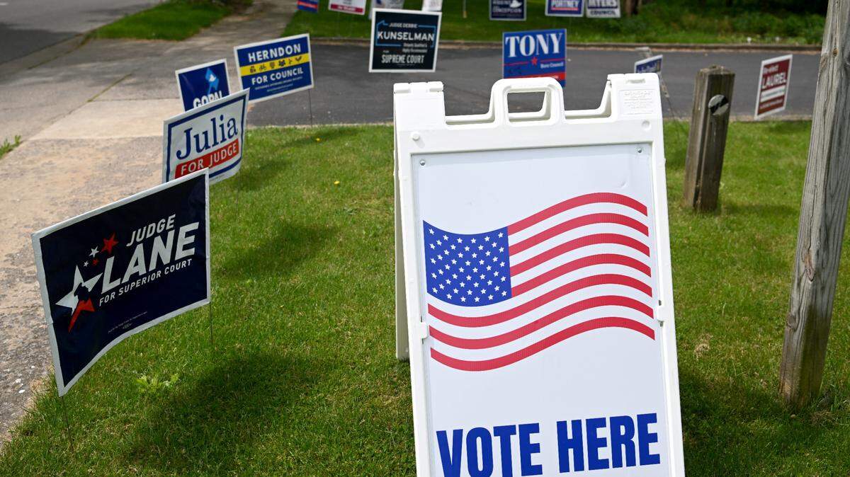 Campaign sings greet voters at the State College Friends Meeting precinct for the primary election on Tuesday, May 16, 2023.
