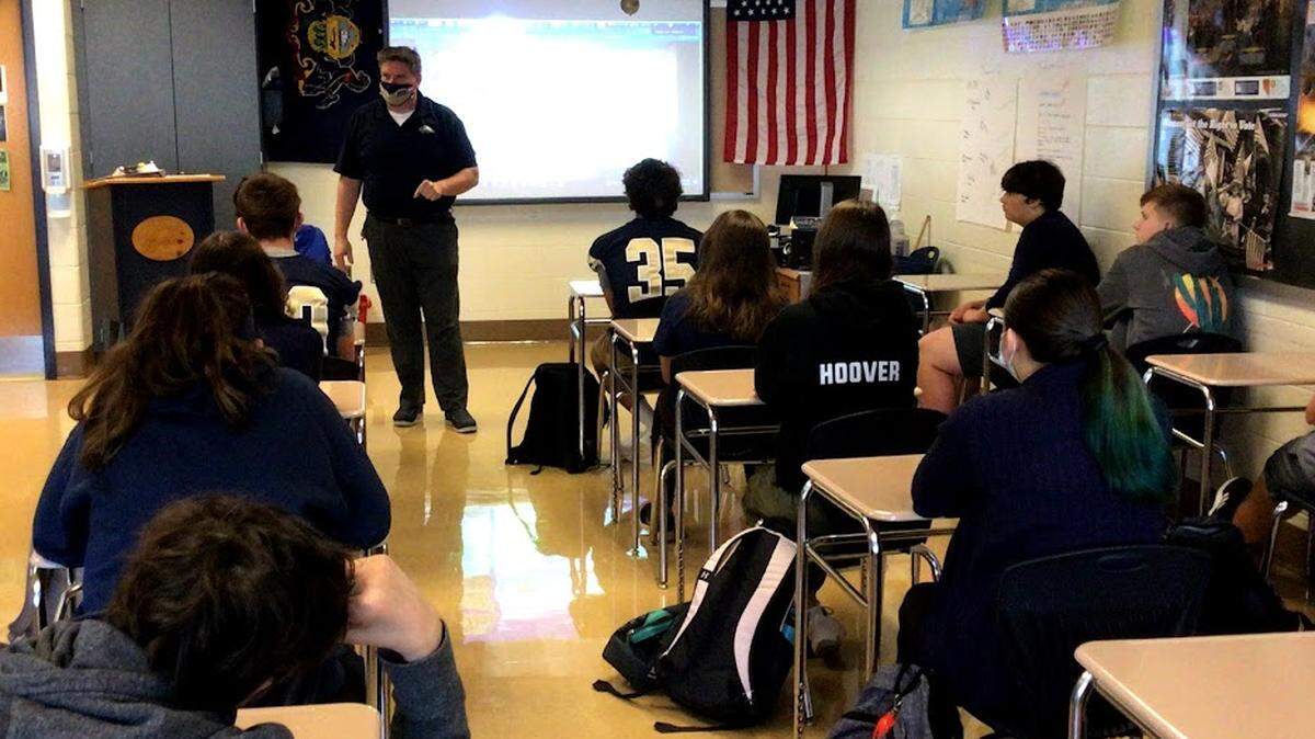 John Coltabaugh teaches a history class at Bald Eagle Area High School about 9/11 on Friday.