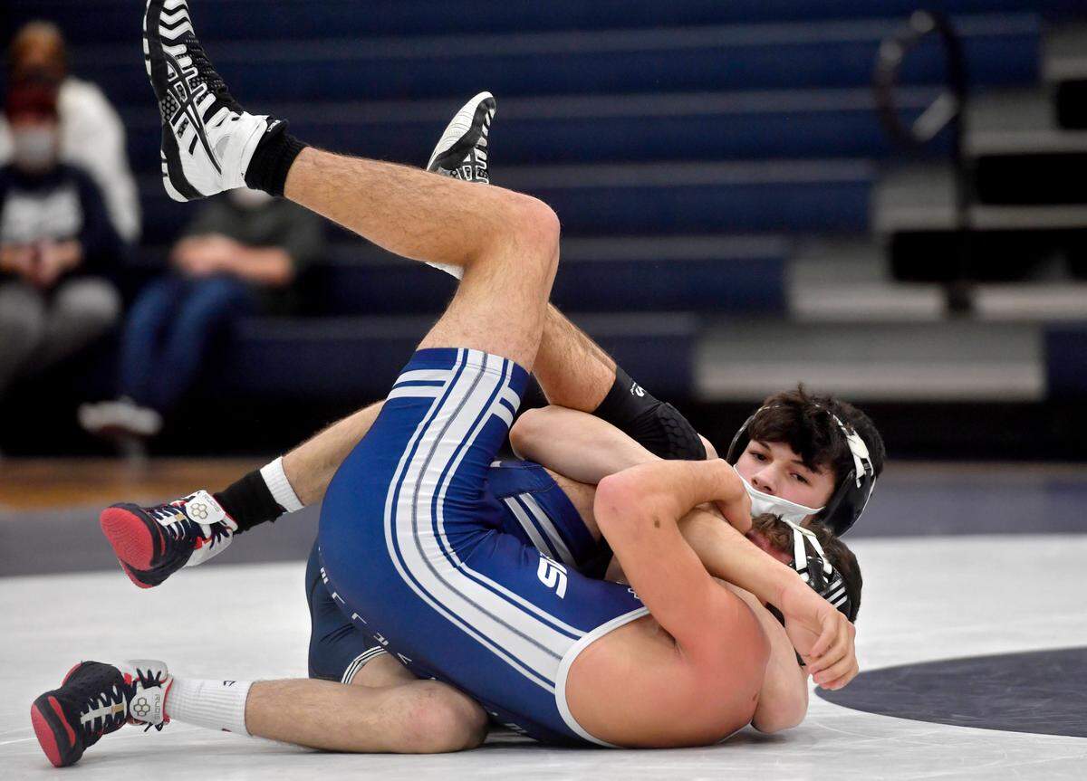 Philipsburg-Osceola’s Austin Foster controls Penns Valley’s Nate Long in the 138 lb bout during the match on Tuesday, Jan. 19, 2021. Foster won by fall.