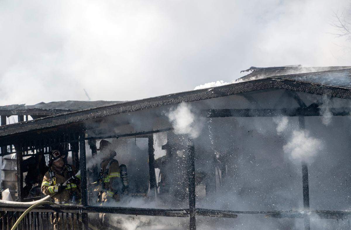 Firefighters respond to a fire at home on the 4000 block of Nittany Valley Drive in Walker Township on Tuesday, Dec. 20, 2022.