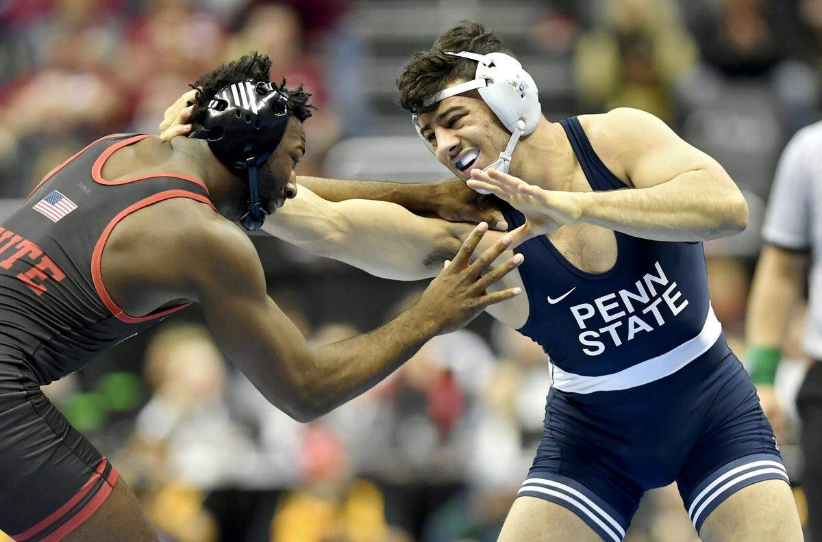 Penn State’s Vincenzo Joseph grapples with Nebraska’s Isaiah White in the 165 lb quarterfinal bout at the NCAA Division 1 Wrestling championships on Friday, March 22, 2019 at PPG Paints Arena. Joseph won by decision, 3-1.