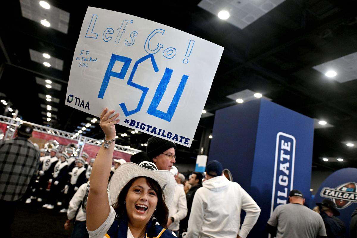 Penn State fans enjoy the Big Ten Fan Fest sponsored by Dr Pepper at the Indianapolis Convention Center before the game on Saturday, Dec. 7, 2024.