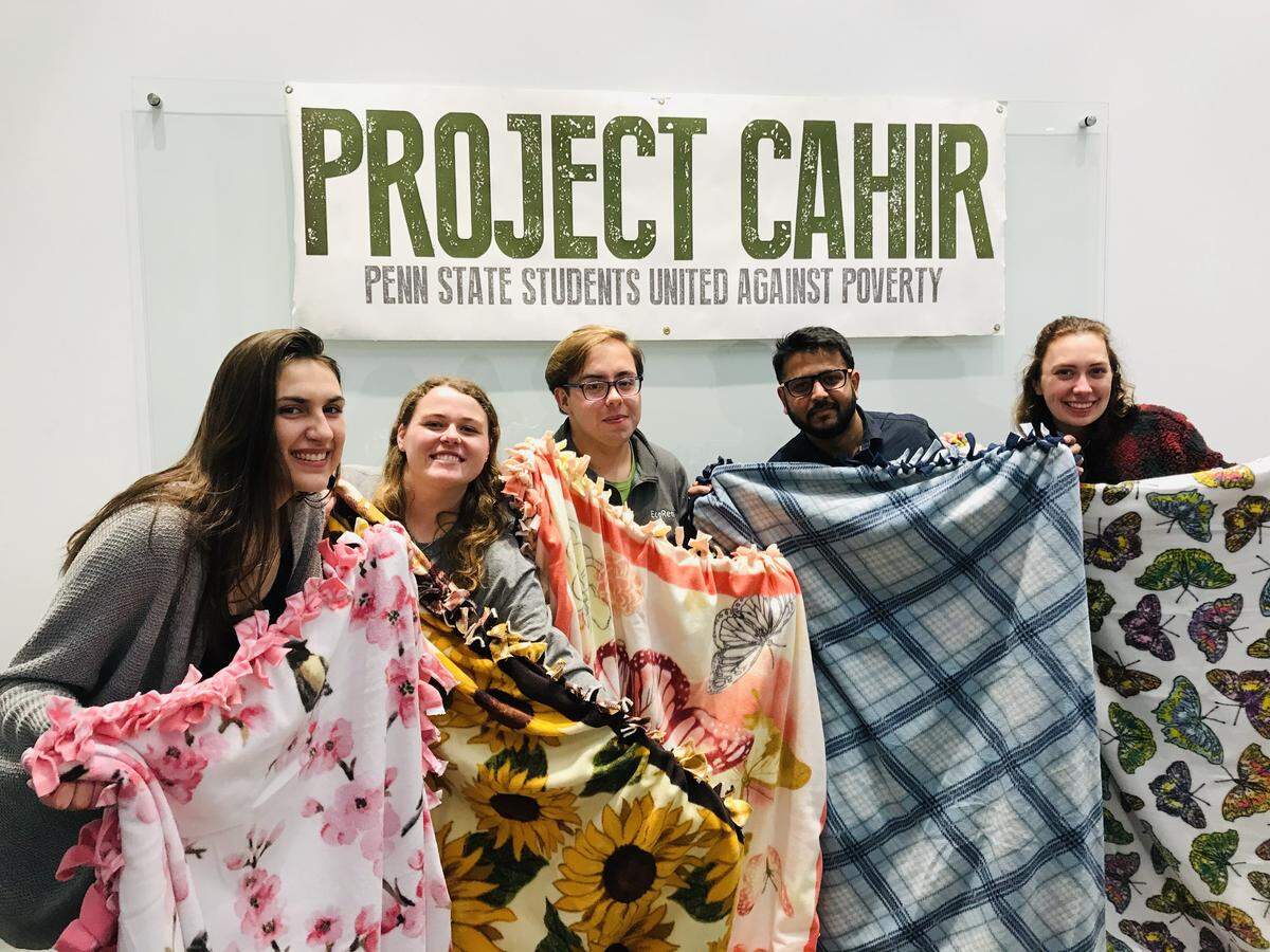 Project Cahir, Penn State student organization working to mitigate poverty among students, made blankets at an event in November.