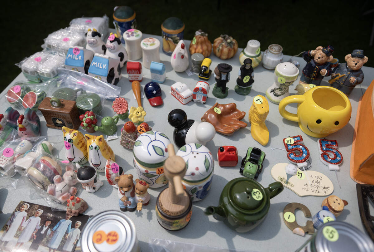 An assortment of salt and pepper shakes at a Snow Shoe yard sale during the 100 Mile Yard Sale on Friday, July 17, 2026.