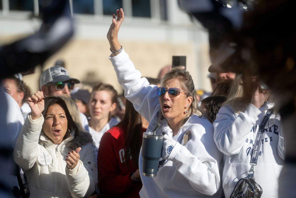 Penn State fans cheer before the team arrives at Beaver Stadium for the game against Ohio State on Saturday, Nov. 2, 2024.