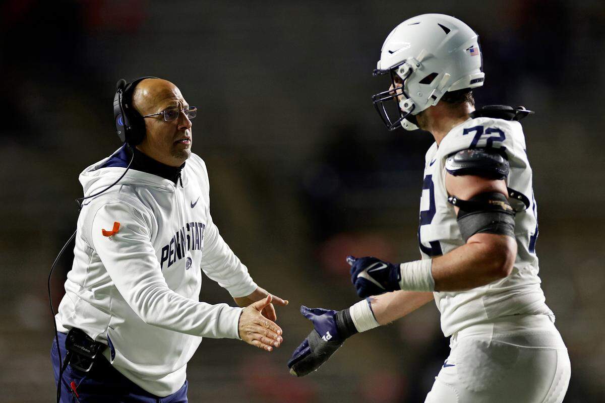 Penn State head coach James Franklin and Bryce Effner against Rutgers during the second half of an NCAA college football game Saturday, Nov. 19, 2022, in Piscataway, N.J. Penn State won 55-10.