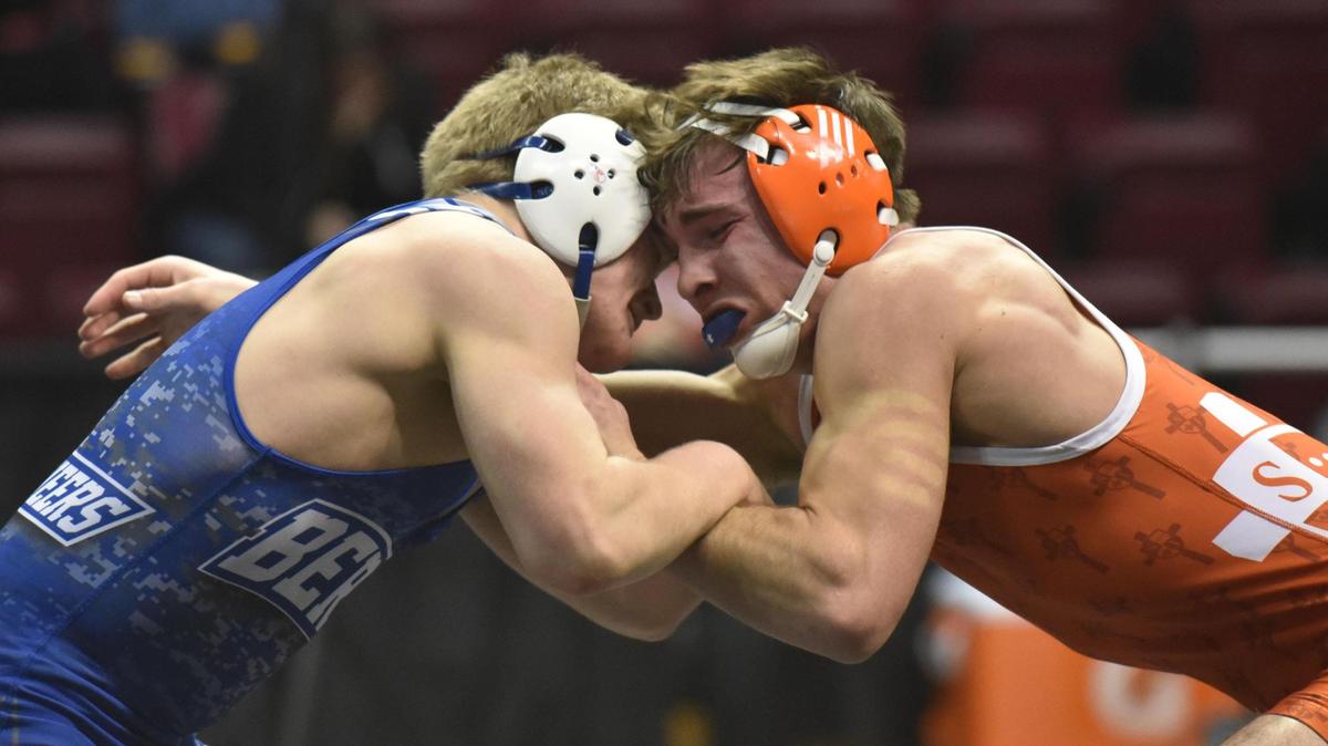 St. Joseph’s Catholic Academy’s Caleb Dowling, right, grapples with Berlin-Brothersvalley’s Tristin Pugh in their 145-pounds Class 2A Southwest Regional final on Saturday in Indiana. Dowling topped Pugh 14-6 for his second straight regional title.