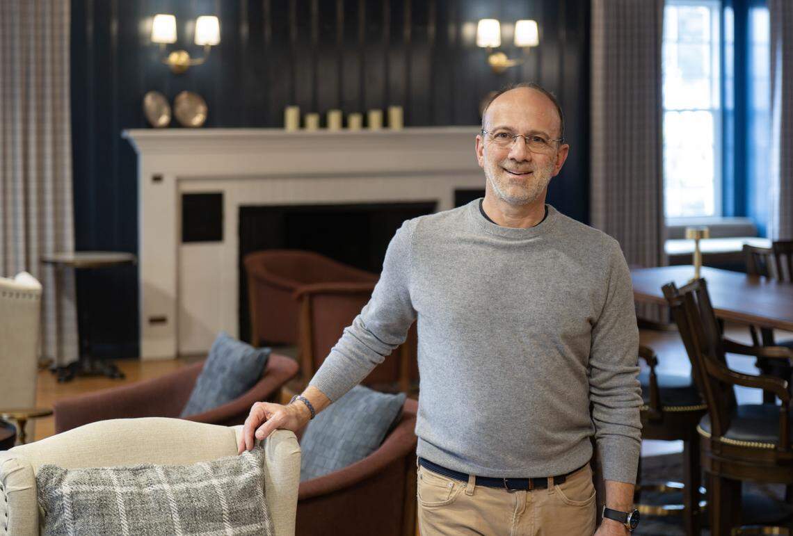 Gary Brandeis, CEO of Scholar Hotels, in the 1855 Lounge in the Nittany Lion Inn on Thursday, Jan. 15, 2026. The wood paneling, fireplace and wood floors are all original to the space. 