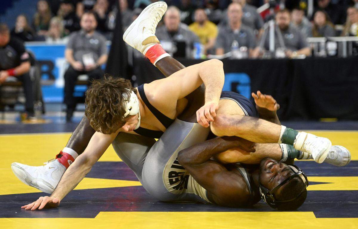 Penn State’s Levi Haines wrestles Purdue’s Kendall Coleman in a 157 lb semifinal bout of the Big Ten wrestling championships at the Crisler Center on Saturday, March 4, 2023.