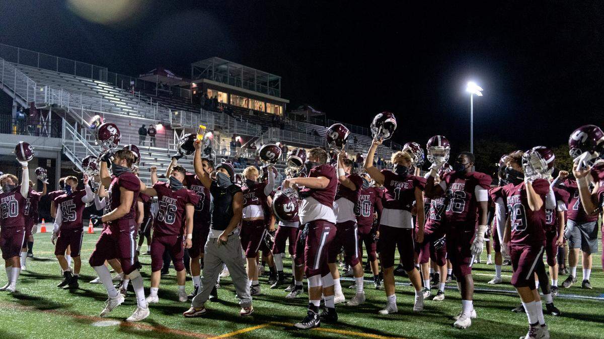 The State College football team sings the alma mater after the win over Cumberland Valley on Friday, Oct. 9, 2020.