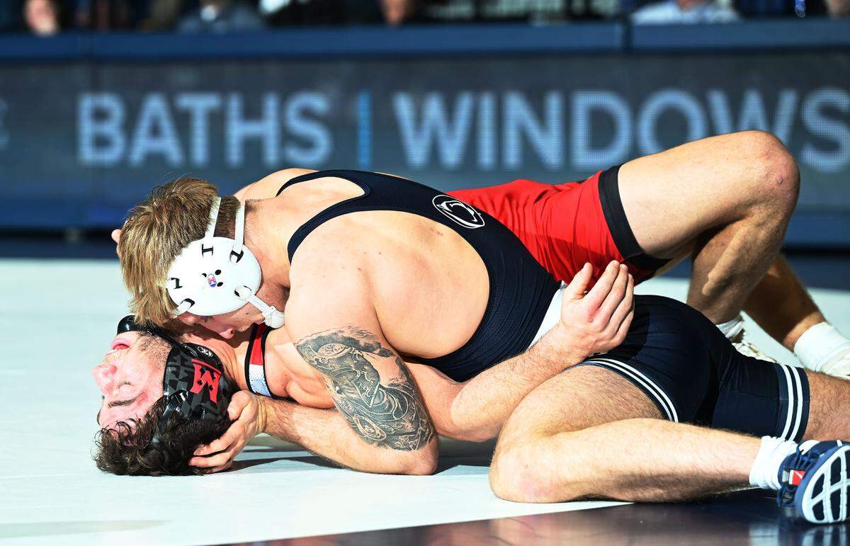 Penn State’s Josh Barr scores a near-fall over Maryland’s Chase Mielnik during their 197-lb bout at Sunday’s meeting in Rec Hall in State College. Barr defeated Mielnik, 17-2.