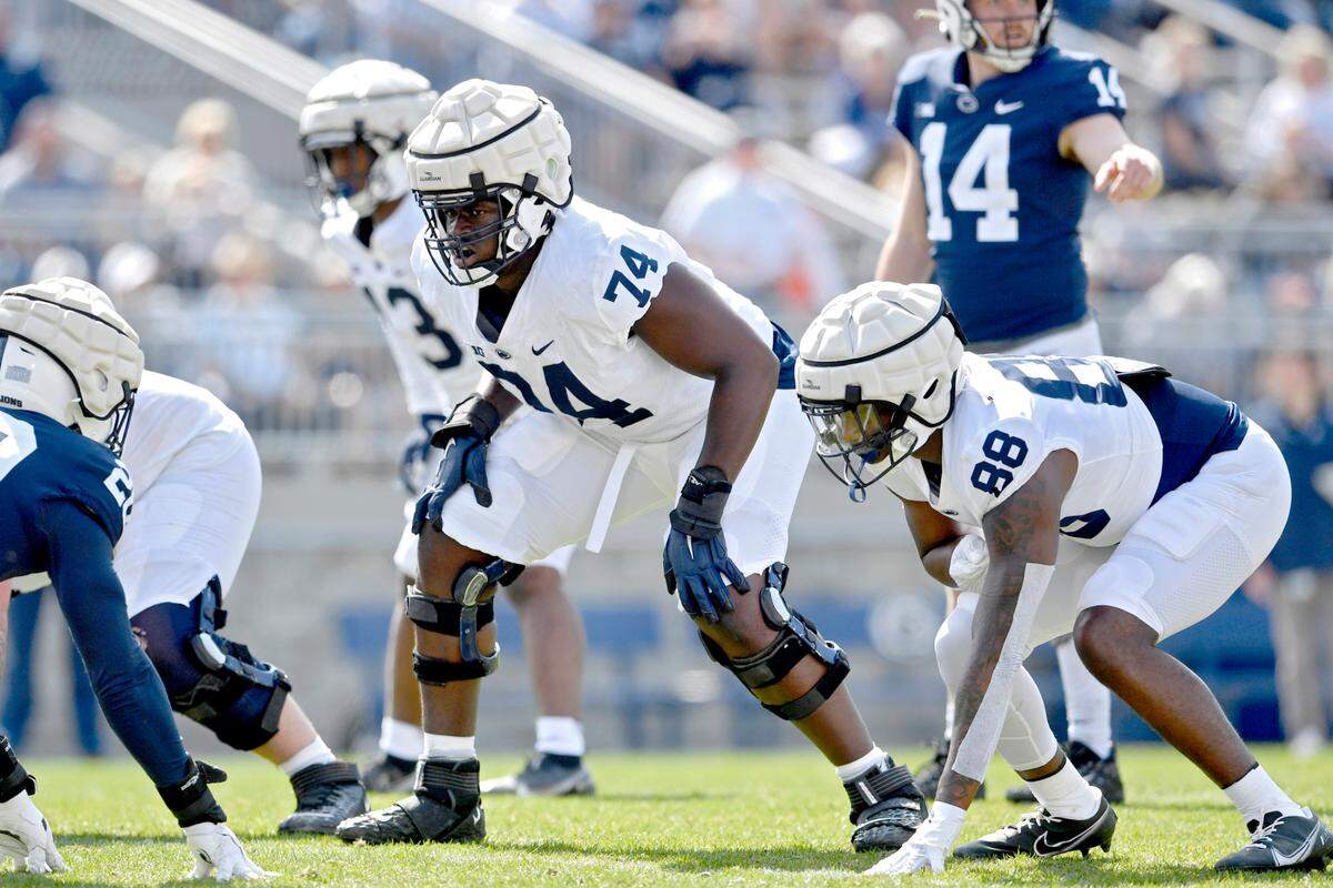 Penn State offensive lineman Olumuyiwa Fashanu lines up for a play during the Blue-White game on Saturday, April 23, 2022.