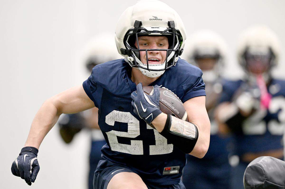 Penn State running back Carson Hansen runs a drill during spring practice on Thursday, March 26, 2026.  
