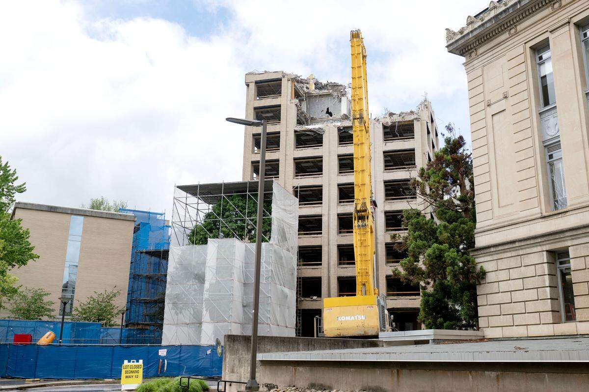 Demolition is underway of Oswald Tower on Thursday, May 29, 2025. Programs that had been in the building moved to the new Susan Welch Liberal Arts Building.