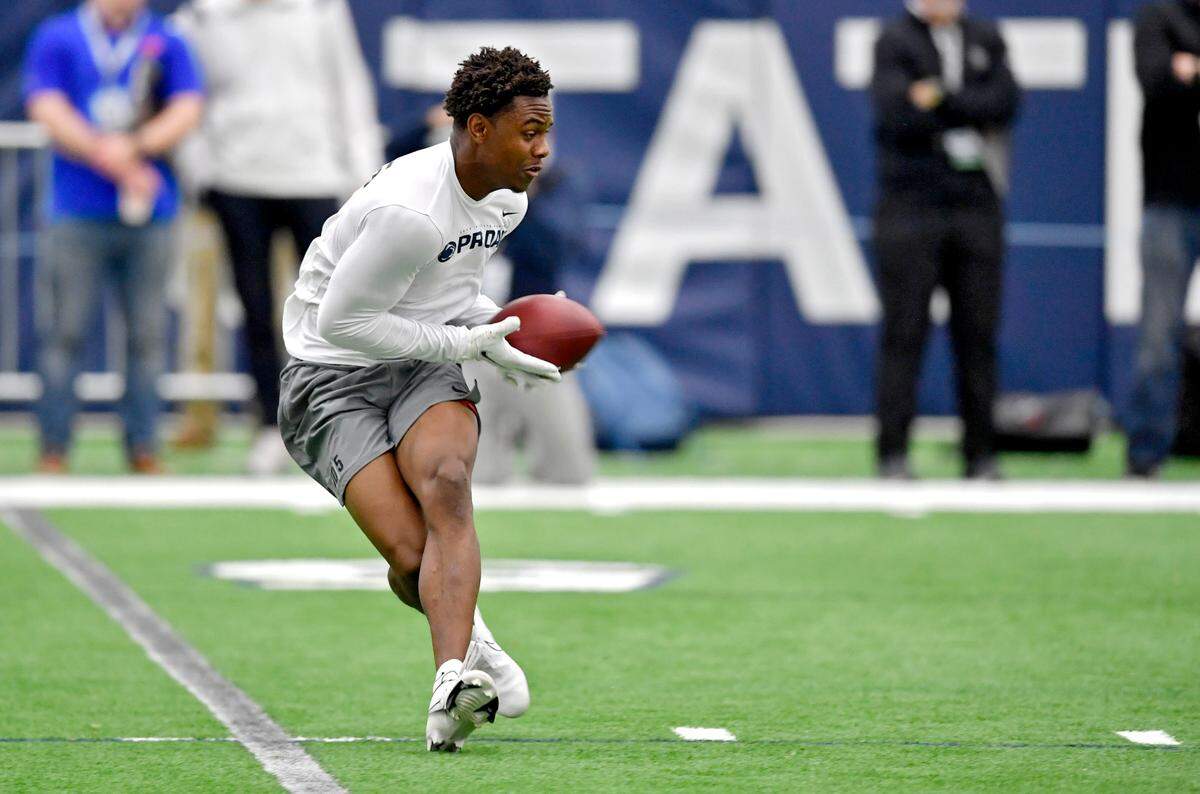 Wide receiver Jahan Dotson makes a catch as he runs a play for scouts during Penn State Pro Day on Thursday.