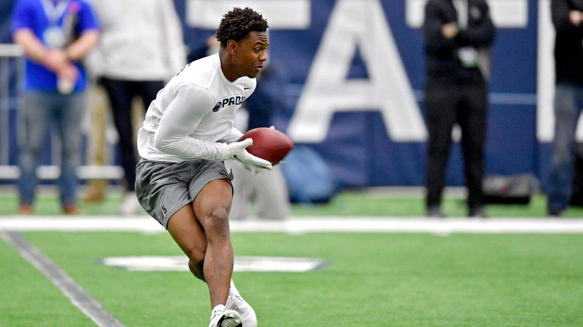 Wide receiver Jahan Dotson makes a catch as he runs a play for scouts during Penn State Pro Day in March.