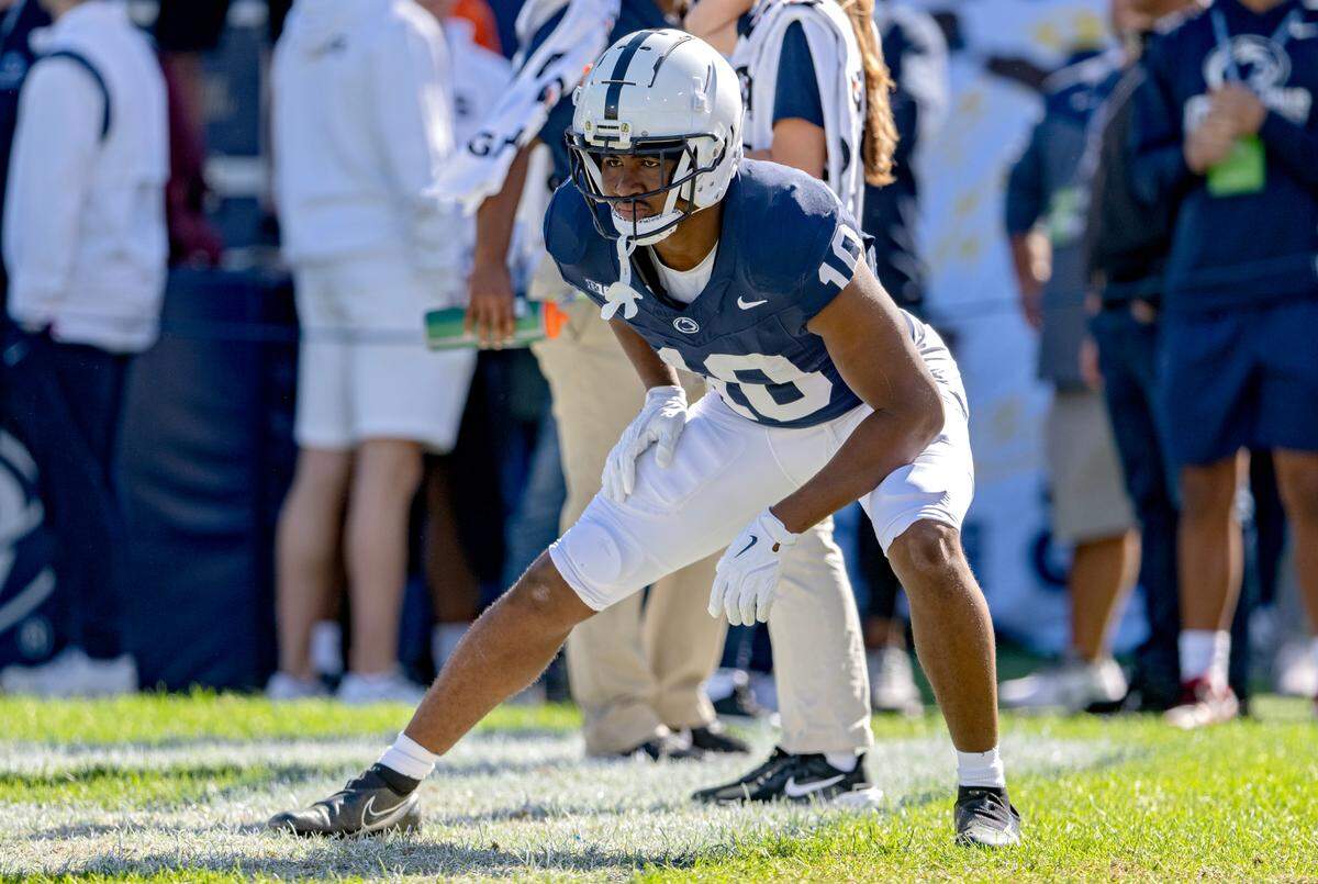 Penn State running back Nick Singleton stretches before the game against UCLA on Saturday, Oct. 5, 2024 at Beaver Stadium.
