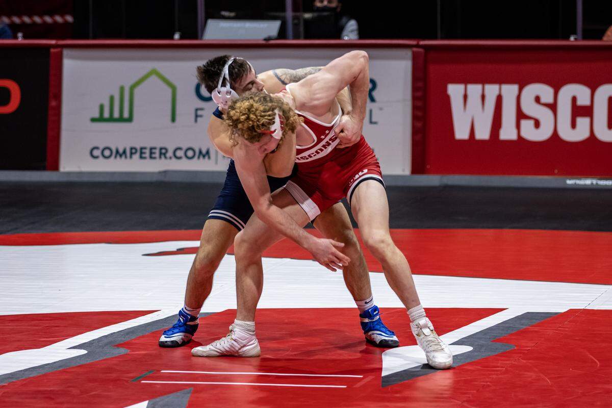 Penn State’s Luke Gardner controls Wisconsin’s Drew Scharenbrock in their 149-pound bout on Tuesday during the Nittany Lions’ 34-6 win. Gardner topped Scharenbrock 7-5 in overtime.