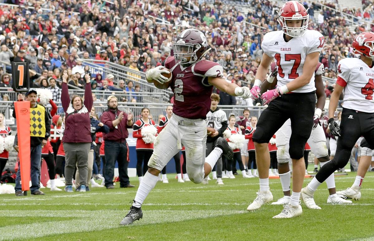 State College’s Dresyn Green runs into the end zone for a touchdown ahead of Cumberland Valley defenders during the Beaver Stadium Classic on Saturday, Oct. 26, 2019.