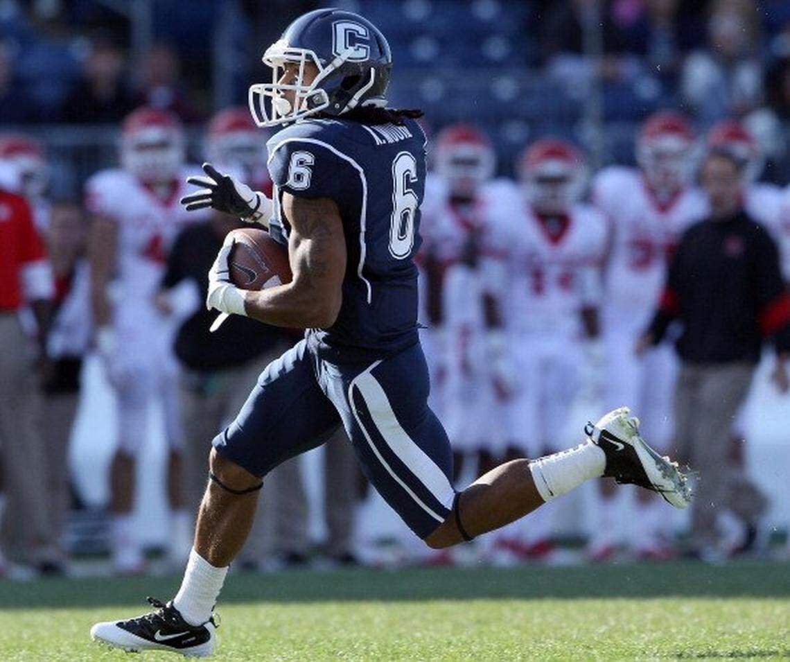 EAST HARTFORD, CT - NOVEMBER 26:  Kashif Moore #6 of the Connecticut Huskies carries the ball in the first half against the Rutgers Scarlet Knights on November 26, 2011 at Rentschler Field in East Hartford, Connecticut.  (Photo by Elsa/Getty Images)