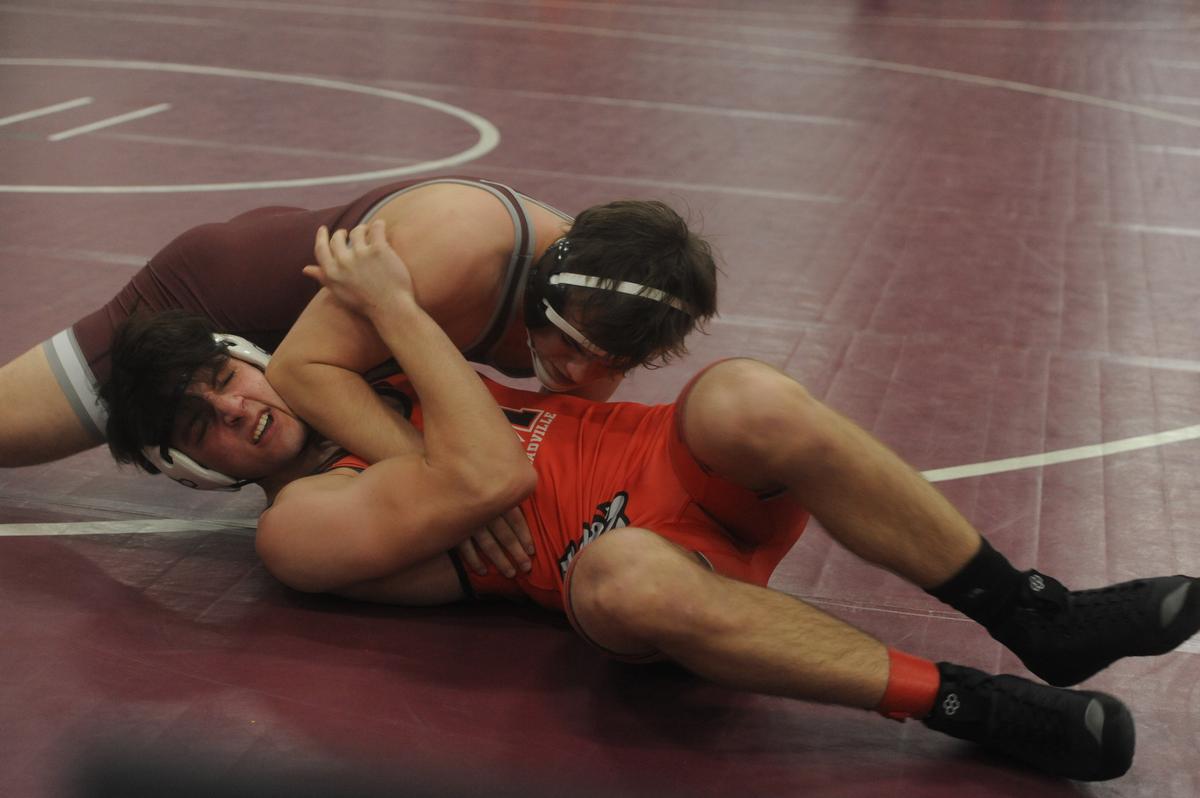 State College’s Carter Weaverling looks to pin Meadville’s Ty Tidball in their 172-pound quarterfinals match of the PIAA Class 3A Northwest Regional Championships on Friday, Feb. 24, 2023 in Altoona. Weaverling did pin Tidball in 1:03.