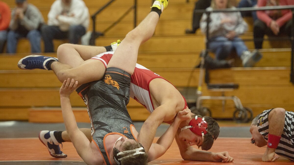 Bellefonte’s Ethan Rossman pins Tyrone’s Aric Reader in the 182 lb bout during the match on Tuesday, Dec. 11, 2018.