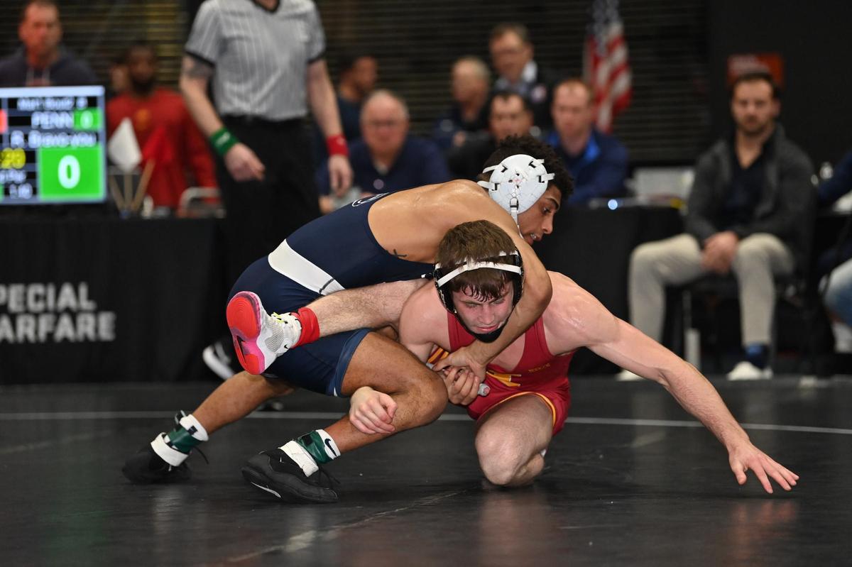 Penn State’s Roman Bravo-Young locks up a cradle on Iowa State’s Ramazan Attasauov in their 133-pound match of the Nittany Lions’ 22-12 win on Tuesday, Dec. 20, 2022. Bravo-Young won 10-2.