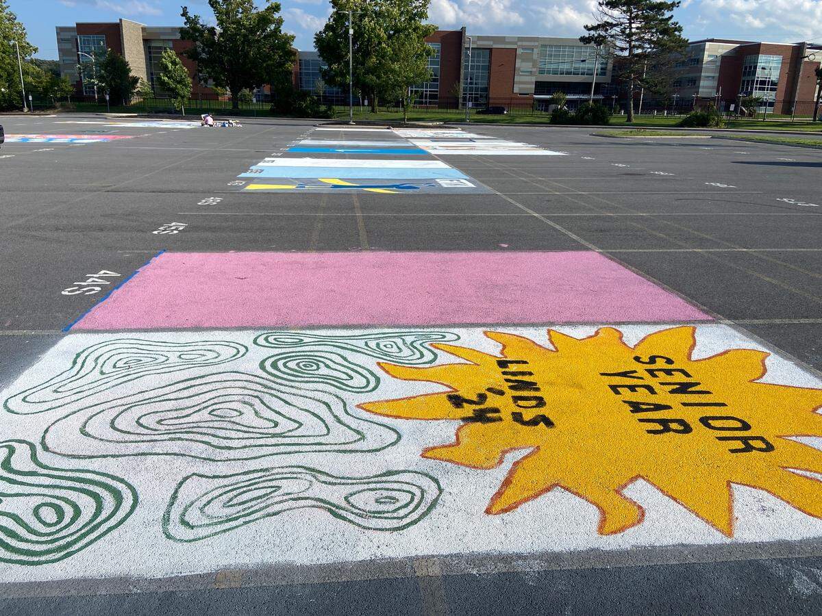 Painted parking spaces at the State College Area High School senior lot on Wednesday, Aug. 18, 2023.