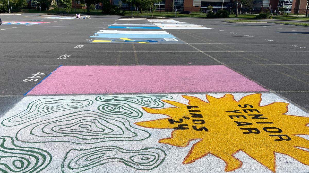 Painted parking spaces at the State College Area High School senior lot are pictured in August 2023.
