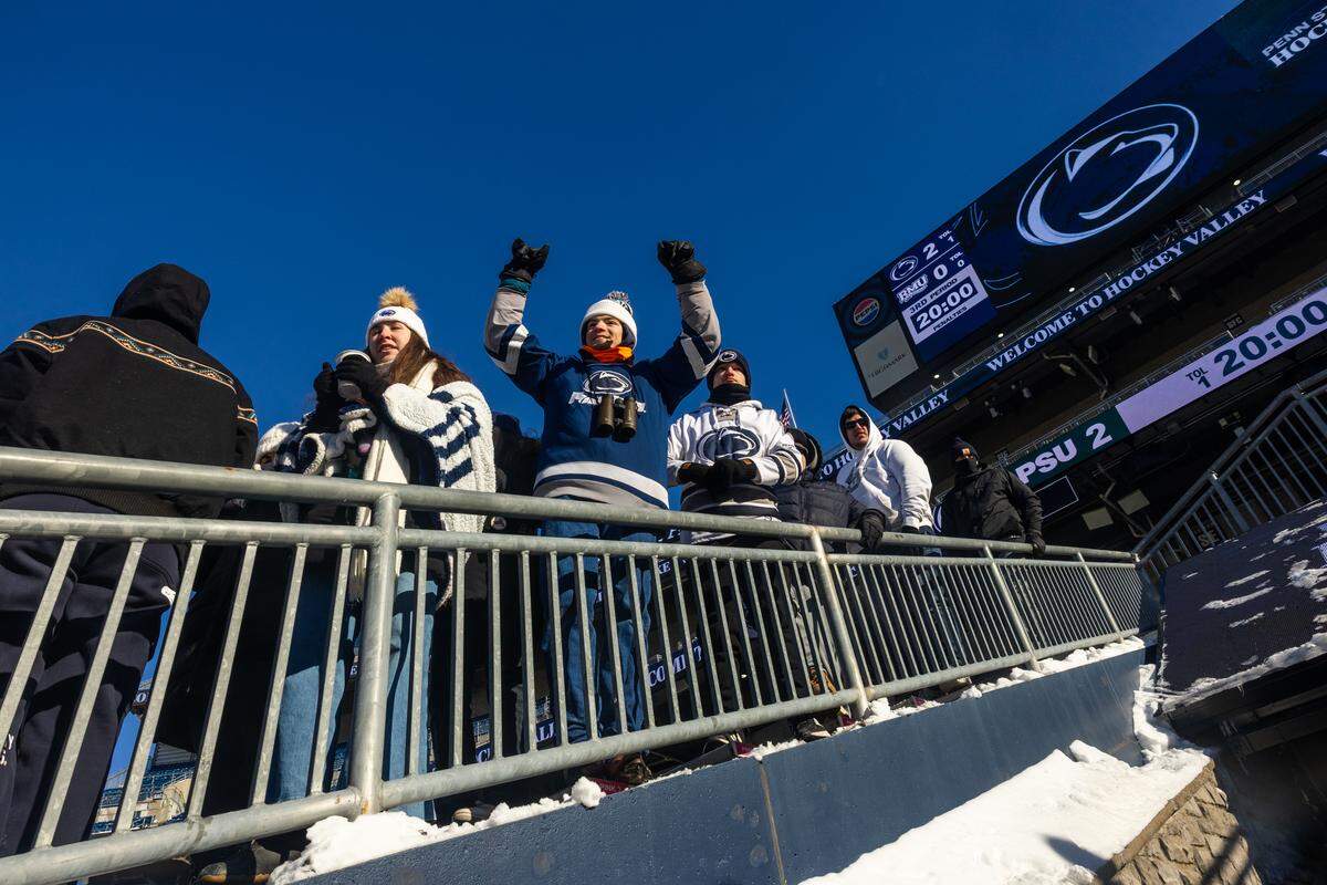 Fans cheer during the Penn State women’s hockey game at Beaver Stadium on Friday, Jan. 30, 2026.