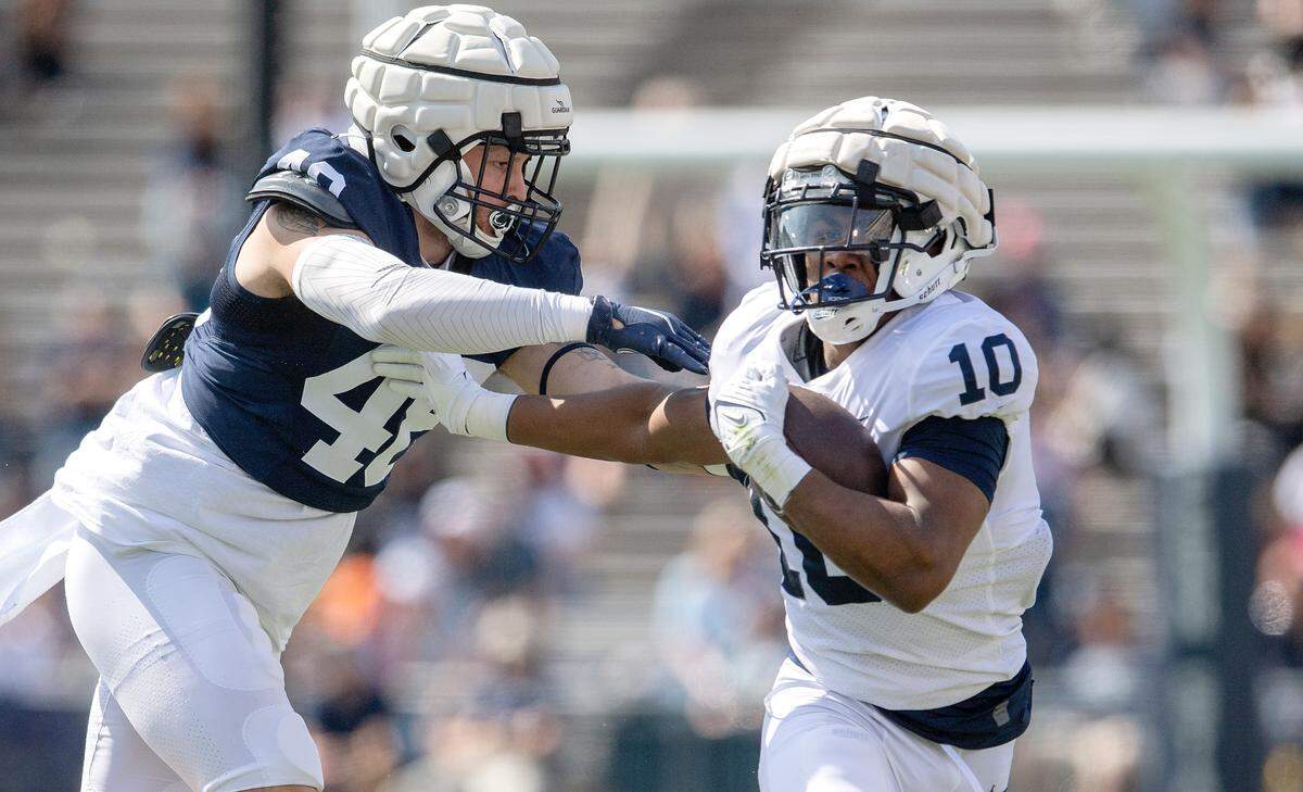Penn State running back Nicholas Singleton cuts down the field with the ball during the Blue-White game on Saturday, April 23, 2022.