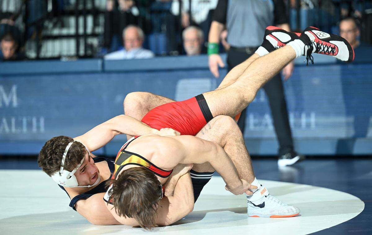 Penn State’s Mitchell Mesenbrink takes down Maryland’s Alex Uryniak at 165 lbs. during Sunday’s meeting at Rec Hall in State College. Mesenbrink defeated Uryniak, 17-3.