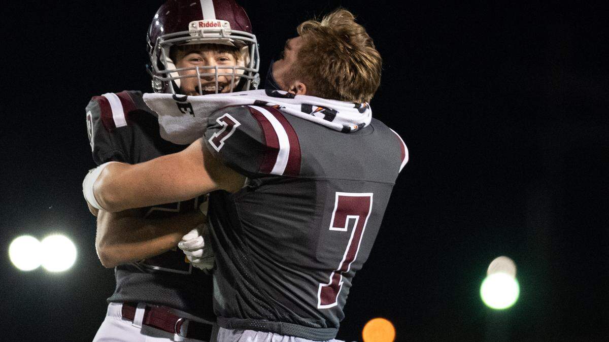 State College’s Nick Kowalski embraces State College’s Sammy Knipe during the District 6 Title Game, where State College faced Altoona, on Friday, 23, 2020 at Mansion Park Stadium in Altoona, PA.