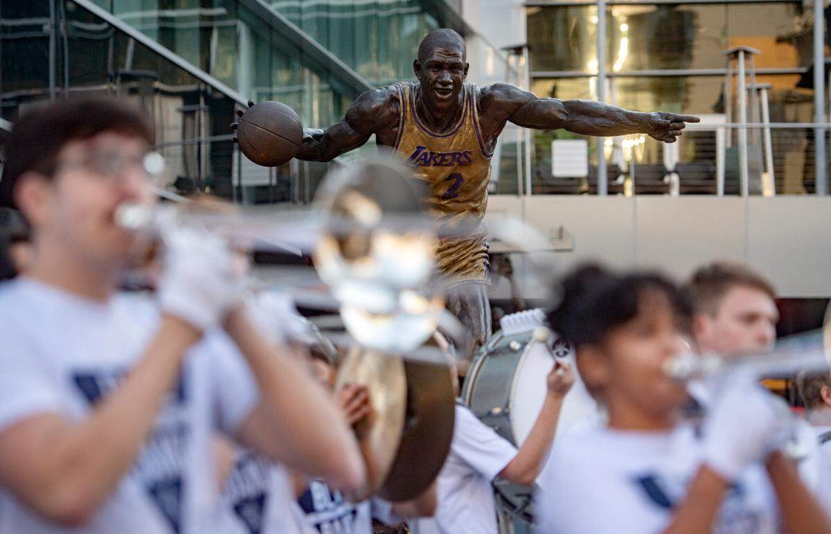 A statue of Magic Johnson was the backdrop as the Penn State Blue Band played at the pep rally hosted by the Penn State Alumni Association on Sunday, Jan. 1, 2023 at LA Live.