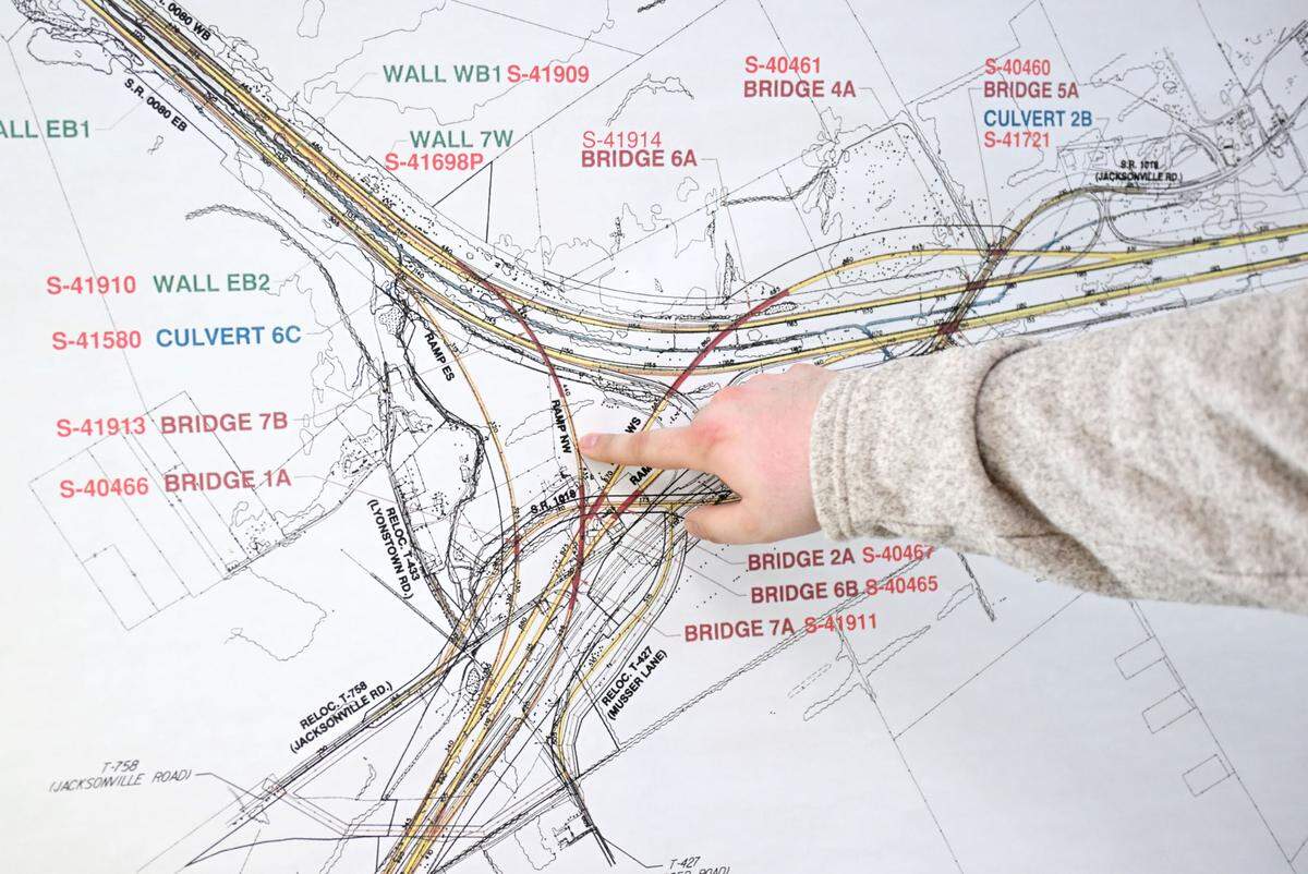 Caleb Meighen, a civil engineer for PennDOT, explains the ramps and bridges around the I-80 and I-99 high speed interchange project.