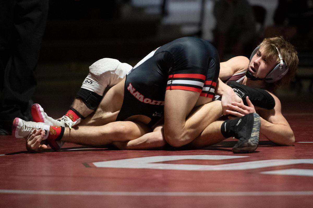 State College’s Eric Weaver wrestles Williamsport’s Devon Harris during a PIAA wrestling bout between State High and Williamsport at State High’s North gym on Monday Jan. 31, 2022. Harris pinned Weaver in 4:22.