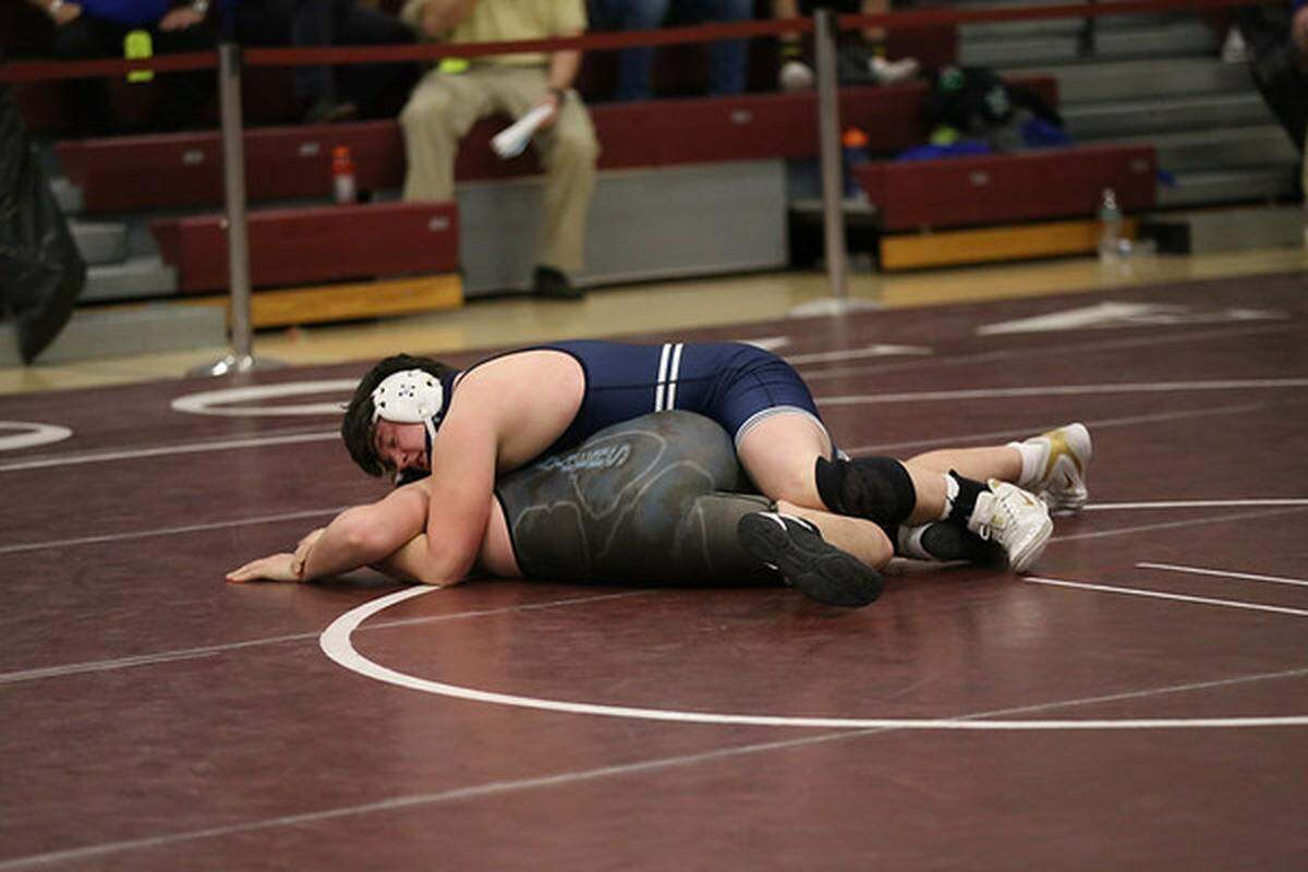 Philipsburg-Osceola’s Parker Moore controls Penn Cambria’s Austin Wagner in their 215 lb consolation finals match on Saturday during the District 6 Class 2A Championships in Altoona.
