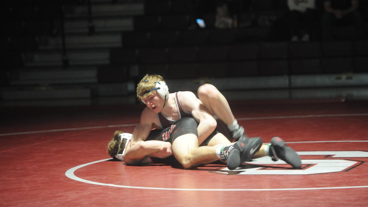 State College’s Asher Cunningham controls Cumberland Valley’s Waylon Kitzmiller in their 145-pound bout of the Little Lions’ 40-29 loss on Wednesday, January 11, 2023. Cunningham beat Kitzmiller, 10-0.